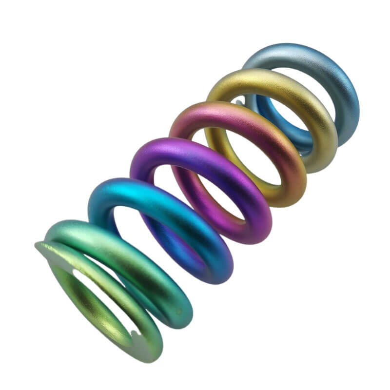 Shock absorbing titanium springs for bicycles