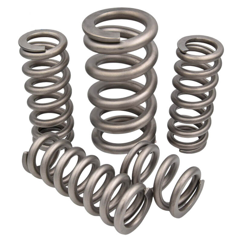 Titanium shock absorbing spring